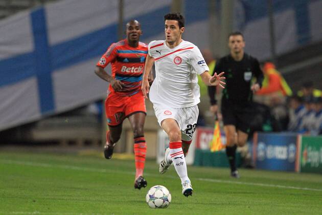 IVAN MARCANO gegen CHARLES KABORE (OM) FOOTBALL: CHAMPIONS LEAGUE: Olympique Marseille (OM) - Olympiakos Piräus. 23 11 2011 - xAUDREYxLEGUENx 