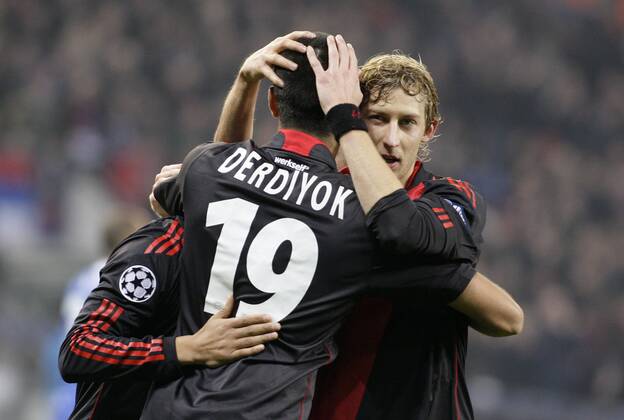 Leverkusen s Eren Derdiyok (19) celebrates scoring the 1:1 with Leverkusen s Stefan Kiessling during the Championsleague match between Bayer 04 Leverkusen and Chelsea London, Bayarena in Leverkusen on November 23., 2011. Bayer 04 Leverkusen gegen Chelsea London am 5. Spieltag der Championsleague in der Saison 2011 2012 am 23. November 2011.