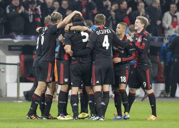 Leverkusen s Manuel Friedrich (5) celebrates scoring the 1:1 with teammates during the Championsleague match between Bayer 04 Leverkusen and Chelsea London, Bayarena in Leverkusen on November 23., 2011. Bayer 04 Leverkusen gegen Chelsea London am 5. Spieltag der Championsleague in der Saison 2011 2012 am 23. November 2011.