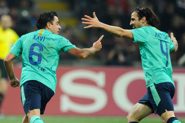 Mailand, 23.11.2011 - UEFA Champions League 2011 2012 - AC Mailand vs FC Barcelona - Xavi Hernandez - Cesc Fabregas 
