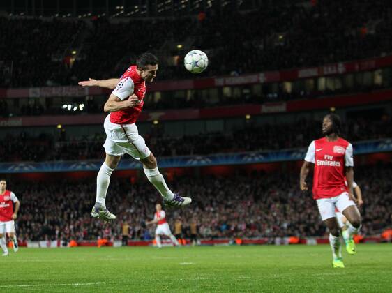 Arsenals Robin Van Persie scoring his sides opening goal UEFA Champions League Group F Arsenal v Borussia Dortmund 23rd November, 2011 EDITORIAL USE ONLY. No use with unauthorised audio, video, data, fixture lists, club league logos or live services. Online in-match use limited to 120 images, no video emulation. No use in betting, games or single club league player publications.