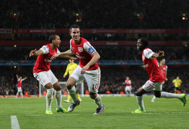 Arsenals Robin Van Persie celebrates scoring his sides opening goal UEFA Champions League Group F Arsenal v Borussia Dortmund 23rd November, 2011 EDITORIAL USE ONLY. No use with unauthorised audio, video, data, fixture lists, club league logos or live services. Online in-match use limited to 120 images, no video emulation. No use in betting, games or single club league player publications.