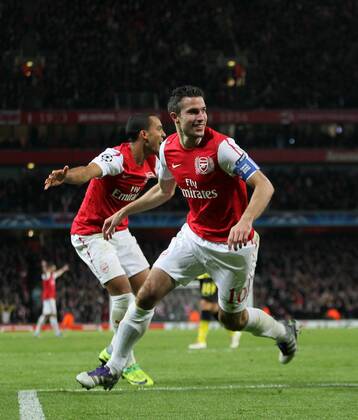 Arsenals Robin Van Persie celebrates scoring his sides opening goal UEFA Champions League Group F Arsenal v Borussia Dortmund 23rd November, 2011 EDITORIAL USE ONLY. No use with unauthorised audio, video, data, fixture lists, club league logos or live services. Online in-match use limited to 120 images, no video emulation. No use in betting, games or single club league player publications.