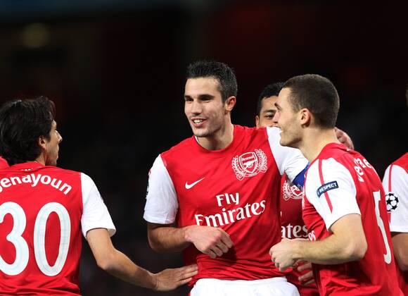 Arsenals Robin Van Persie celebrates scoring his sides second goal UEFA Champions League Group F Arsenal v Borussia Dortmund 23rd November, 2011 EDITORIAL USE ONLY. No use with unauthorised audio, video, data, fixture lists, club league logos or live services. Online in-match use limited to 120 images, no video emulation. No use in betting, games or single club league player publications.