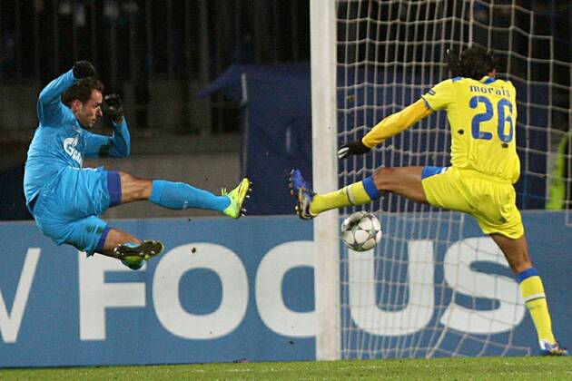 November 23, 2011. - Russia, Saint Petersburg. - Champions League 2011 12 FC Zenit (Saint Petersburg) vs FC APOEL (Cyprus). In picture: FC Zenit s player Danko Lazovic (8) and FC APOEL s player Nuno Morais (26). PeterxKovalev 
