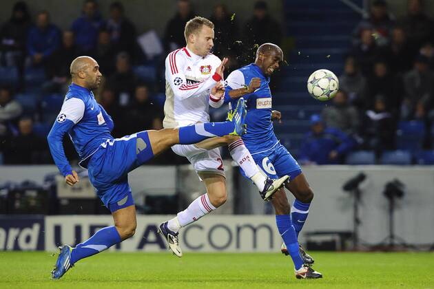 Anthony Vanden Borre of KRC Genk (L) Michal Kadlec of Bayer Leverkusen (C) David Hubert of KRC Genk KRC Genk v Bayer Leverkusen UEFA Champions League 2011 2012 xVIxJackxJacobsxIVx 479285