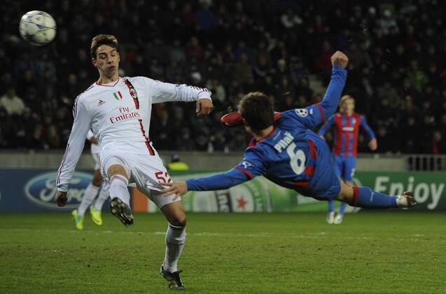 Mattia De Sciglio of Milan (left) and Vaclav Pilar of Viktoria during their final Champions League group H soccer match FC Viktoria Plzen vs AC Milan at Synot Tip Arena Eden stadium in Prague, Czech Republic, Tuesday, December 6, 2011. (CTKxPhoto MichalxKamaryt)  CTKPhoto024201112061007801