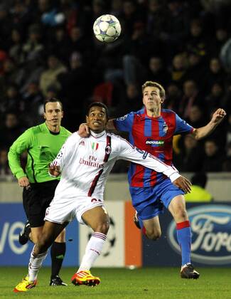 Urby Emanuelson of Milan (left) and Vladimir Darida of Viktoria during their final Champions League group H soccer match FC Viktoria Plzen vs AC Milan at Synot Tip Arena Eden stadium in Prague, Czech Republic, Tuesday, December 6, 2011. (CTKxPhoto VitxSimanek)  CTKPhoto034201112061036601