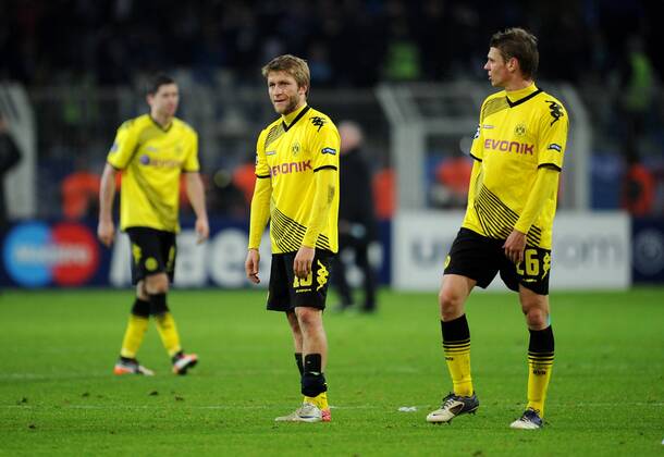 FUSSBALL CHAMPIONS LEAGUE SAISON 2011 2012 Borussia Dortmund - Olympique Marseille 06.12.2011 Robert Lewandowski, Jakub KUBA Blaszczykowski und Lukasz Piszczek (v.l., alle Borussia Dortmund) sind nach dem Abpfiff enttaeuscht