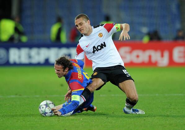 FC Basel - Manchester United, Nemanja Vidic of Manchester United gets his leg trapped under Marco Streller of FC Basel and is subsequently stretchered off at St. Jakob Park, Basel 