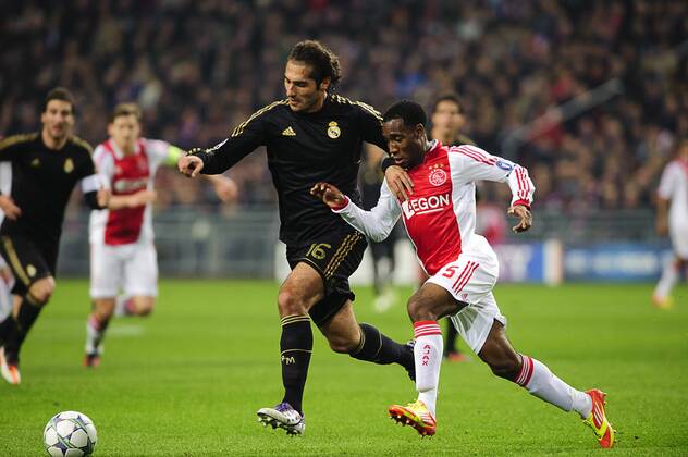 Hamit Altintop of Real Madrid CF (L) Vurnon Anita of Ajax Ajax v Real Madrid UEFA Champions League 2011 2012 xVIxJackxJacobsxIVx 480445