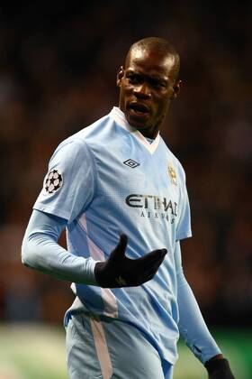 Football - Champions League - Manchester City vs. Bayern Munich Mario Balotelli of Manchester City shows his frustration at a linesman at the Etihad Stadium 