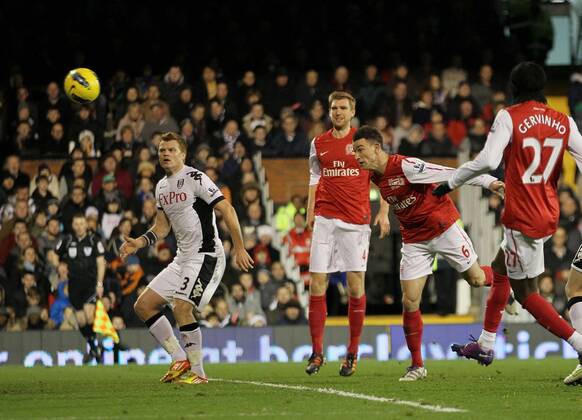 Arsenals Laurent Koscielny scoring his sides opening goal Barclays Premier League Fulham v Arsenal at Craven Cottage, London 2nd January, 2012 EDITORIAL USE ONLY. No use with unauthorised audio, video, data, fixture lists, club league logos or live services. Online in-match use limited to 120 images, no video emulation. No use in betting, games or single club league player publications.