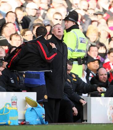 Manchester Uniteds Sir Alex Ferguson looks on dejected ..Liverpool v Manchester United in the the FA Cup Fourth Round sponsored by Budweiser at Anfireld, Liverpool. 28th January 2012. EDITORIAL USE ONLY. No use with unauthorised audio, video, data, fixture lists, club league logos or live services. Online in-match use limited to 120 images, no video emulation. No use in betting, games or single club league player publications.