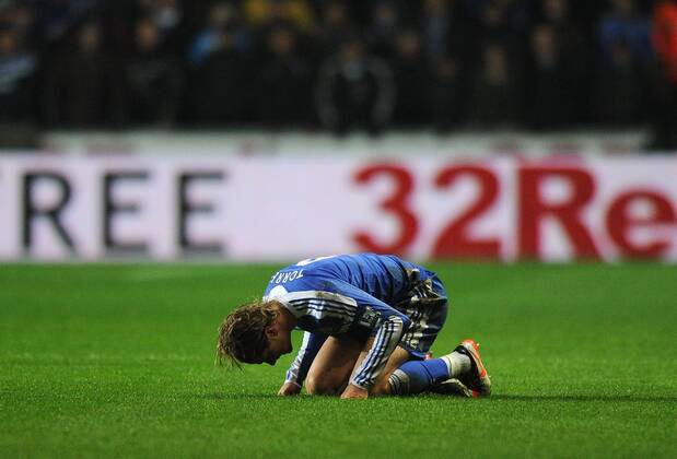 Football - Premier League - Swansea City vs. Chelsea FC - Chelsea s Fernando Torres reacts having been fouled by Ashley Williams of Swansea City at the Liberty Stadium, Swansea