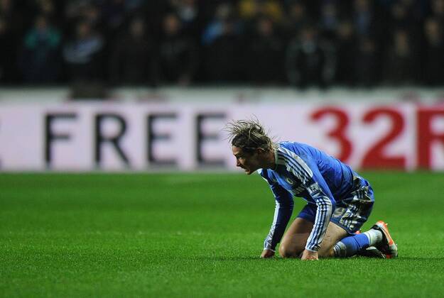 Football - Premier League - Swansea City vs. Chelsea FC - Chelsea s Fernando Torres reacts having been fouled by Ashley Williams of Swansea City at the Liberty Stadium, Swansea