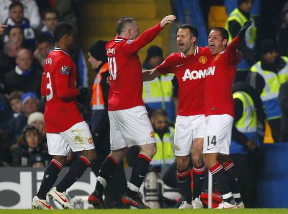 Javier Hernandez Chicharito of Manchester United celebrates scoring his side s third goal with Ryan giggs, Wayne Rooney and Patrice Evra - Barclays Premier League - Chelsea FC London vs. Manchester United at Stamford Bridge, London.5th February, 2012. EDITORIAL USE ONLY. No use with unauthorised audio, video, data, fixture lists, club league logos or live services. Online in-match use limited to 120 images, no video emulation. No use in betting, games or single club league player publications.