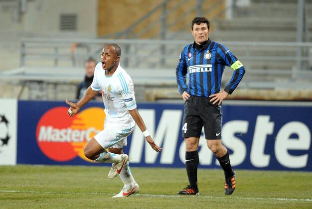 Andre AYEW (om) - Javier ZANETTI (int) - 8eme de finale - Stade Velodrome - Football : Marseille Inter Milan - Ligue des Champions - 22 02 2012 AnthonyBIBARD FEP Panoramic 