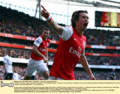 Football - Premier League - Arsenal FC London vs. Tottenham Hotspur - Arsenal s Tomas Rosicky celebrates scoring at the Emirates Stadium