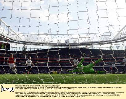 Football - Premier League - Arsenal FC London vs. Tottenham Hotspur - Arsenal s Robin van Persie looks to pounce as Tottenham s Brad Friedel is beaten at the Emirates Stadium