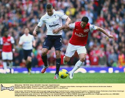 Football - Premier League - Arsenal FC London vs. Tottenham Hotspur - Tottenham s Kyle Walker challenges Arsenal s Mikel Arteta at the Emirates Stadium