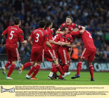 Martin Skrtel of Liverpool celebrates scoring with Steven Gerrard during the Cardiff City vs Liverpool FC during the Carling Cup Final, London..26th February, 2012. EDITORIAL USE ONLY. No use with unauthorised audio, video, data, fixture lists, club league logos or live services. Online in-match use limited to 120 images, no video emulation. No use in betting, games or single club league player publications. PC 01