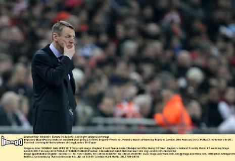 Englands Stuart Pearce looks on dejected after going 2-0 down..England V Holland , Friendly match at Wembley Stadium, London. 29th February 2012. EDITORIAL USE ONLY. No use with unauthorised audio, video, data, fixture lists, club league logos or live services. Online in-match use limited to 120 images, no video emulation. No use in betting, games or single club league player publications.