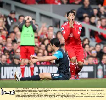 Liverpools Luis Suarez looks on dejected..Liverpool FC V Arsenal FC, Barclays Premier League match at Anfield, Liverpool. 3rd March 2012. EDITORIAL USE ONLY. No use with unauthorised audio, video, data, fixture lists, club league logos or live services. Online in-match use limited to 120 images, no video emulation. No use in betting, games or single club league player publications.