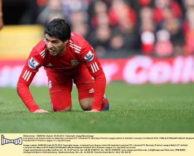 Liverpools Luis Suarez looks on dejected..Liverpool FC V Arsenal FC, Barclays Premier League match at Anfield, Liverpool. 3rd March 2012. EDITORIAL USE ONLY. No use with unauthorised audio, video, data, fixture lists, club league logos or live services. Online in-match use limited to 120 images, no video emulation. No use in betting, games or single club league player publications.