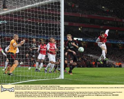 Arsenals Laurent Koscielny scoring his sides opening goal Arsenal v AC Milan, UEFA Champions League, Knockout round, Second Leg at the Emirates, London. 6th March 2012 EDITORIAL USE ONLY. No use with unauthorised audio, video, data, fixture lists, club league logos or live services. Online in-match use limited to 120 images, no video emulation. No use in betting, games or single club league player publications.