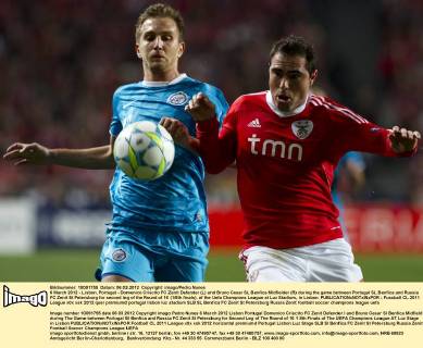 6 March 2012 - Lisbon, Portugal - Domenico Criscito FC Zenit Defender (L) and Bruno Cesar SL Benfica Midfielder (R) during the game between Portugal SL Benfica and Russia FC Zenit St Petersburg for second leg of the Round of 16 (1 8th finals), of the Uefa Champions League at Luz Stadium, in Lisbon. 