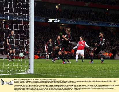 Arsenals Tomas Rosicky scoring his sides second goal Arsenal v AC Milan, UEFA Champions League, Knockout round, Second Leg at the Emirates, London. 6th March 2012 EDITORIAL USE ONLY. No use with unauthorised audio, video, data, fixture lists, club league logos or live services. Online in-match use limited to 120 images, no video emulation. No use in betting, games or single club league player publications.