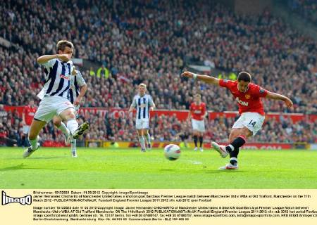 Javier Hernandez Chicharito of Manchester United takes a shot on goal.Barclays Premier League match between Manchester Utd v WBA at Old Trafford, Manchester on the 11th March 2012 - EDITORIAL USE ONLY. No use with unauthorised audio, video, data, fixture lists, club league logos or live services. Online in-match use limited to 120 images, no video emulation. No use in betting, games or single club league player publications.