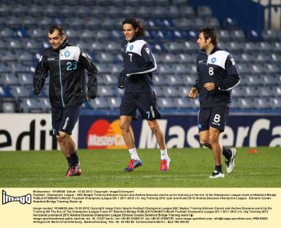 Football - Champions League - SSC Neapel Training Edinson Cavani and Andrea Dossena warms up for training on the eve of the Champions League clash at Stamford Bridge 