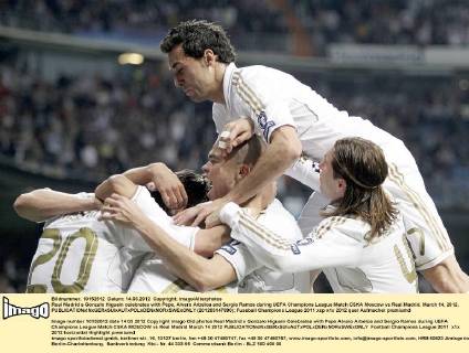 Real Madrid s Gonzalo Higuain celebrates with Pepe, Alvaro Arbeloa and Sergio Ramos during UEFA Champions League Match CSKA Moscow vs Real Madrid. March 14, 2012.  (201203147890)