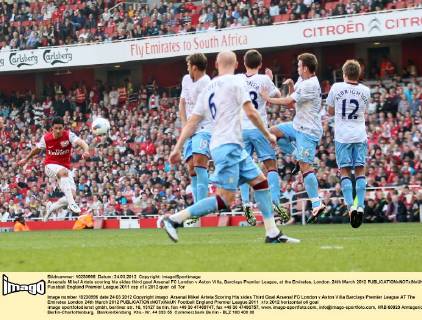 Arsenals Mikel Arteta scoring his sides third goal Arsenal FC London v Aston Villa, Barclays Premier League, at the Emirates, London. 24th March 2012 EDITORIAL USE ONLY. No use with unauthorised audio, video, data, fixture lists, club league logos or live services. Online in-match use limited to 120 images, no video emulation. No use in betting, games or single club league player publications.