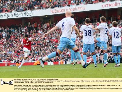Arsenals Mikel Arteta scoring his sides third goal Arsenal FC London v Aston Villa, Barclays Premier League, at the Emirates, London. 24th March 2012 EDITORIAL USE ONLY. No use with unauthorised audio, video, data, fixture lists, club league logos or live services. Online in-match use limited to 120 images, no video emulation. No use in betting, games or single club league player publications.