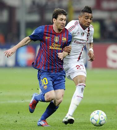 Db Milano 28 03 2012 - Champions League Milan-Barcelona foto Daniele Buffa Image Sport nella foto: Lionel Messi-Kevin Prince Boateng 