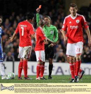 Benficas Maxi Pereira gets sent off..Chelsea v Benfica, Champions League Quarter Final, at Stamford Bridge, London. 4th April 2012. EDITORIAL USE ONLY. No use with unauthorised audio, video, data, fixture lists, club league logos or live services. Online in-match use limited to 120 images, no video emulation. No use in betting, games or single club league player publications.