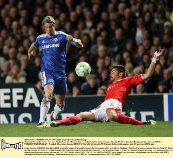 Chelseas Fernando Torres tussles with Benficas Javi Garcia..Chelsea v Benfica, Champions League Quarter Final, at Stamford Bridge, London. 4th April 2012. EDITORIAL USE ONLY. No use with unauthorised audio, video, data, fixture lists, club league logos or live services. Online in-match use limited to 120 images, no video emulation. No use in betting, games or single club league player publications.