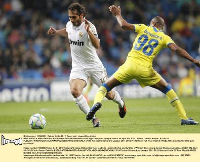 Real Madrid s Hamit Altintop and Apoel s William Boaventura during Champions League match on april 4th 2012...Photo: Cesar Cebolla ALFAQUI  (014)