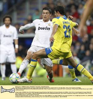 Real Madrid s Cristiano Ronaldo and Apoel s Helio Pinto during Champions League match on april 4th 2012...Photo: Cesar Cebolla ALFAQUI  (020)