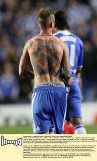 Chelseas Raul Meireles shows off his tattoos at the end of the match Chelsea v Benfica, Champions League Quarter Final, at Stamford Bridge, London. 4th April 2012 EDITORIAL USE ONLY. No use with unauthorised audio, video, data, fixture lists, club league logos or live services. Online in-match use limited to 120 images, no video emulation. No use in betting, games or single club league player publications.