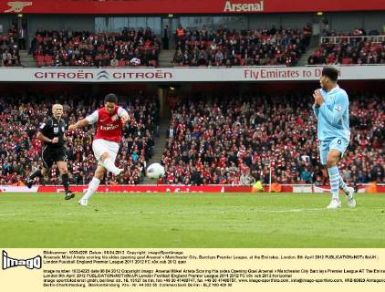 Arsenals Mikel Arteta scoring his sides opening goal Arsenal v Manchester City, Barclays Premier League, at the Emirates, London. 8th April 2012 EDITORIAL USE ONLY. No use with unauthorised audio, video, data, fixture lists, club league logos or live services. Online in-match use limited to 120 images, no video emulation. No use in betting, games or single club league player publications.