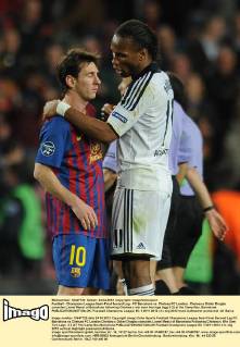 Football - Champions League Semi-Final Second Leg - FC Barcelona vs. Chelsea FC London; Chelsea s Didier Drogba consoles Lionel Messi of Barcelona following Chelsea s win over two legs (agg 3-2) at the Camp Nou, Barcelona 