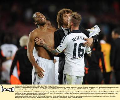 Football - Champions League Semi-Final Second Leg - FC Barcelona vs. Chelsea FC London; Chelsea s David Luiz, Didier Drogba and Raul Meireles celebrate their win over two legs (agg 3-2) at the Camp Nou, Barcelona 