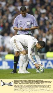Real Madrid s Cristiano Ronaldo and referee Viktor Kassai during Champions League match on april 25th 2012...  (012)