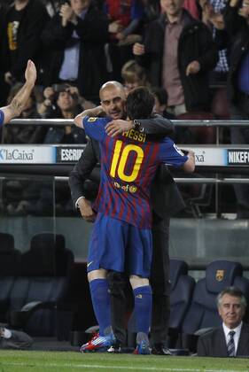 05-05-2012. Barcelona. Liga BBVA Spain. FC Barcelona vs. RCD Espanyol Barcelona -- Lionel Messi celebrate his four score of the match with Coach Josep Pep Guardiola. 