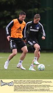 Football - Champions League - Chelsea Training Gary Cahill pressures Fernando Torres at the Chelsea training ground in Cobham 