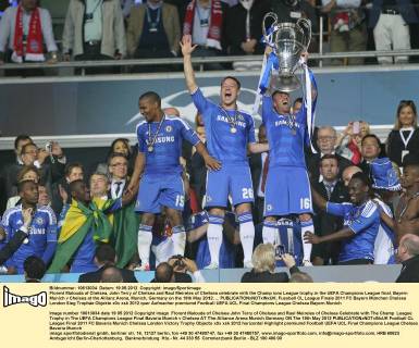 Florent Malouda of Chelsea, John Terry of Chelsea and Raul Meireles of Chelsea celebrate with the Champ ions League trophy.in the UEFA Champions League final, Bayern Munich v Chelsea at the Allianz Arena, Munich, Germany on the 19th May 2012. ... EDITORIAL USE ONLY. No use with unauthorised audio, video, data, fixture lists, club league logos or live services. Online in-match use limited to 120 images, no video emulation. No use in betting, games or single club league player publications.